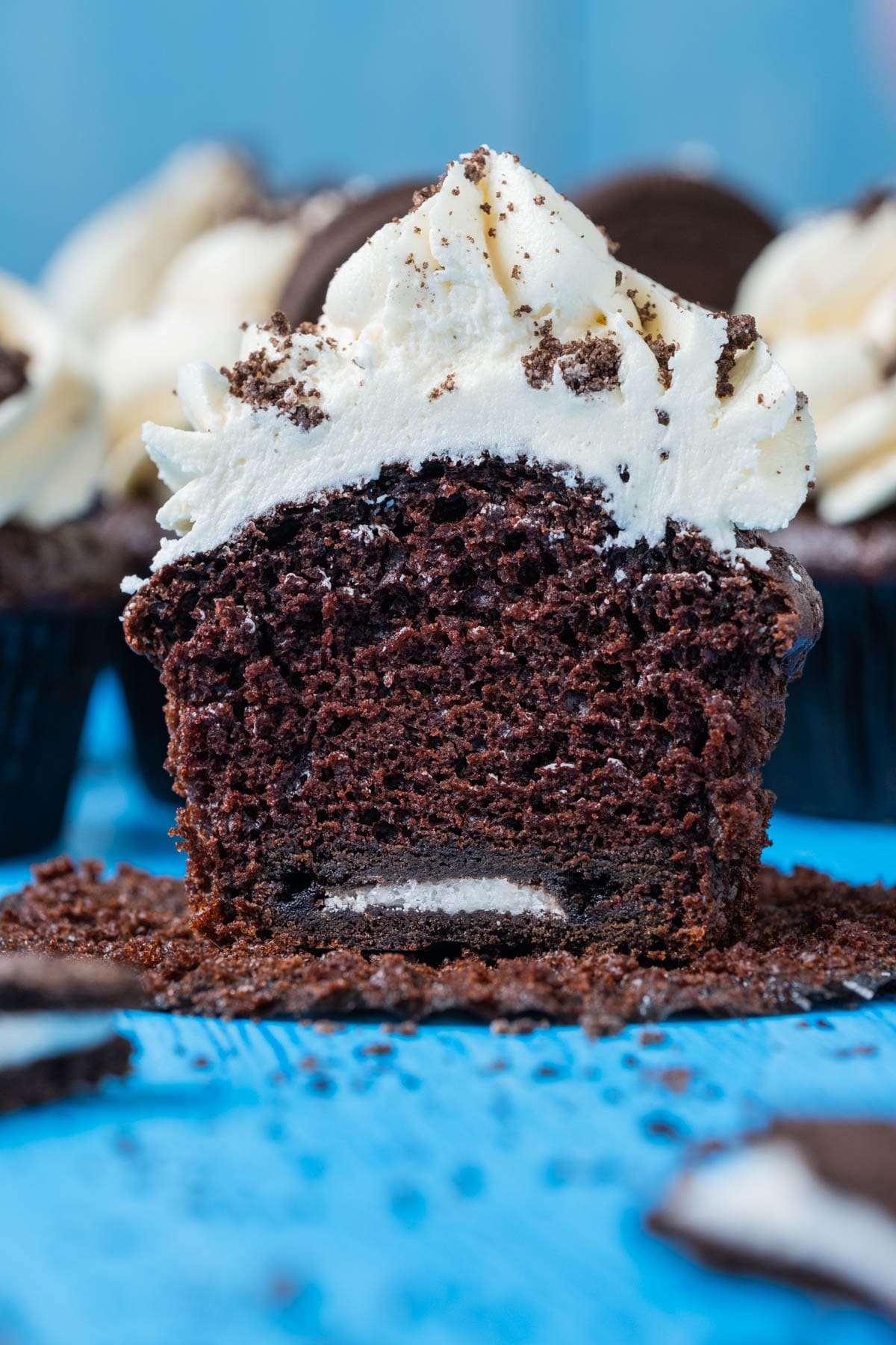 Vegan oreo cupcake cut in half.