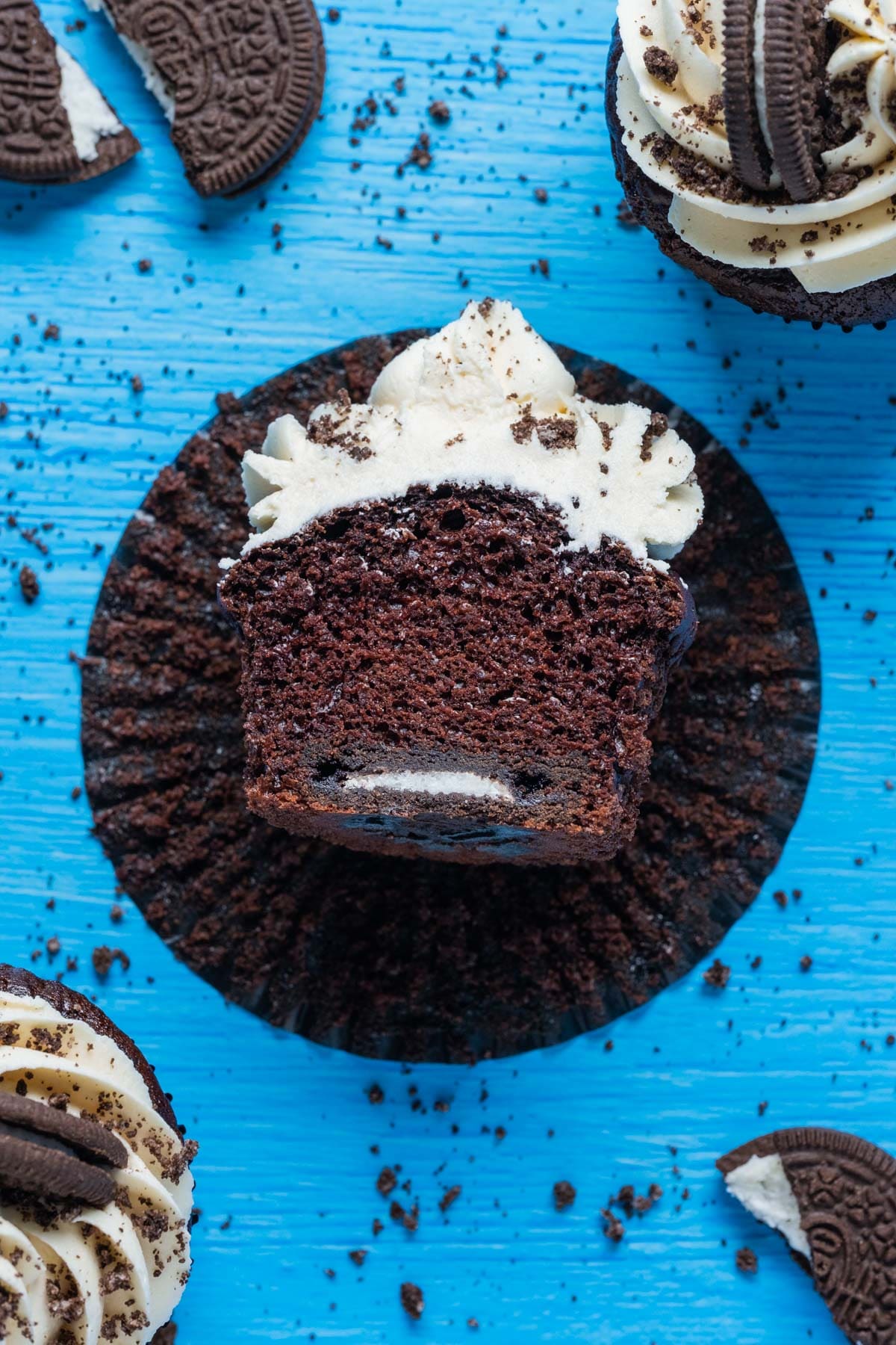 Vegan oreo cupcake cut in half.